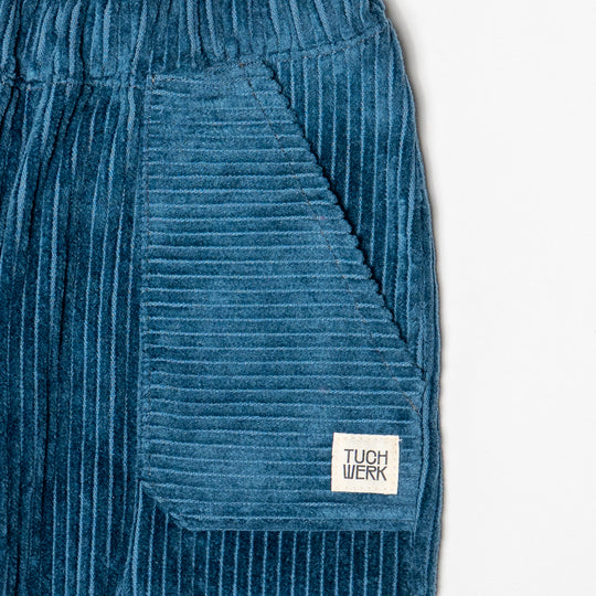 Cordhose für Babys und Kinder, bequeme Kindermode, petrol und beere, für aktive Kinder, hergestellt in Österreich, Kinderbekleidungslabel, mit Taschen