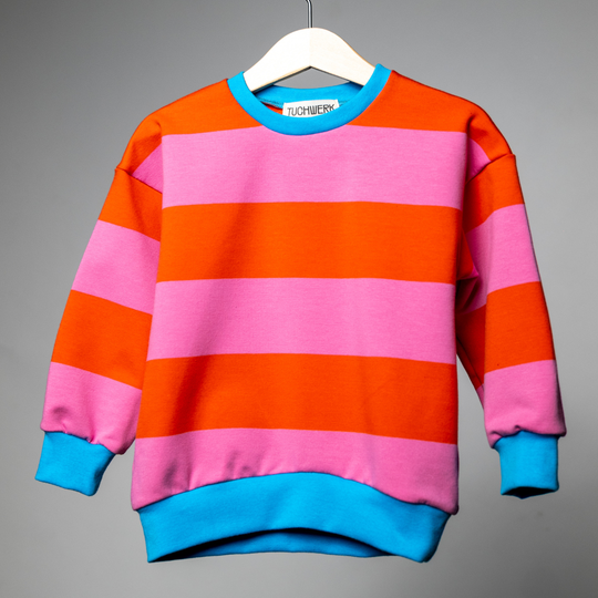 Sweater mit Streifen, rosa/orange, blau gestreift, Trendfarbe, bequeme Kindermode, Kinderbekleidung Jungs und Mädchen, unsex, Tuchwerk, Innsbruck, hergestellt in Österreich
