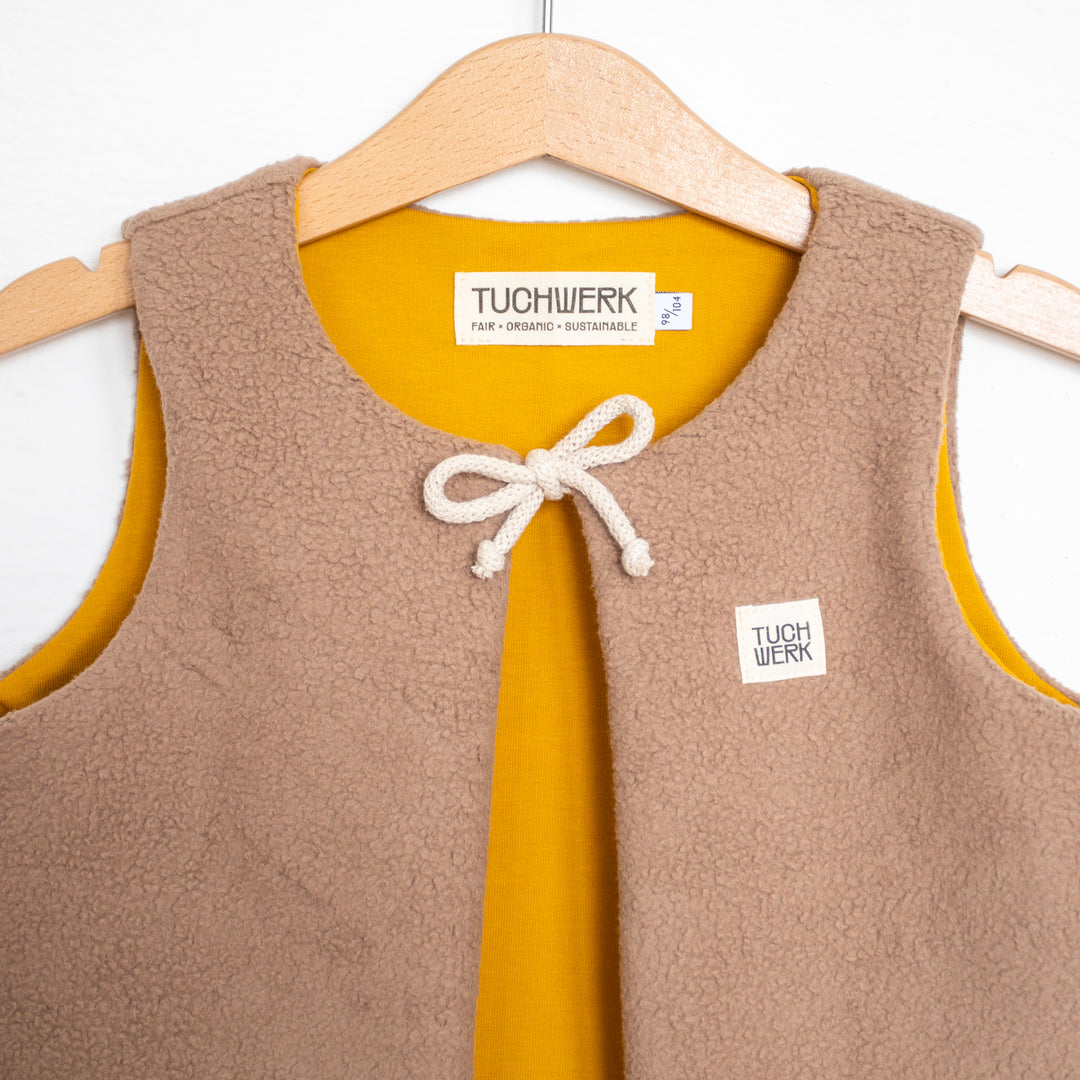 Kuschelige Babyweste aus Sherpa